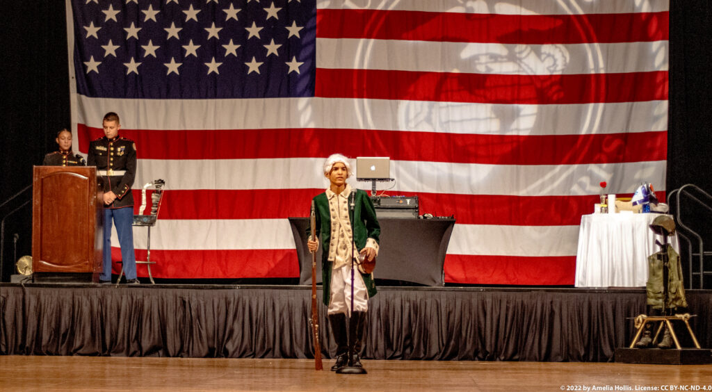 Students performing a historical military play.