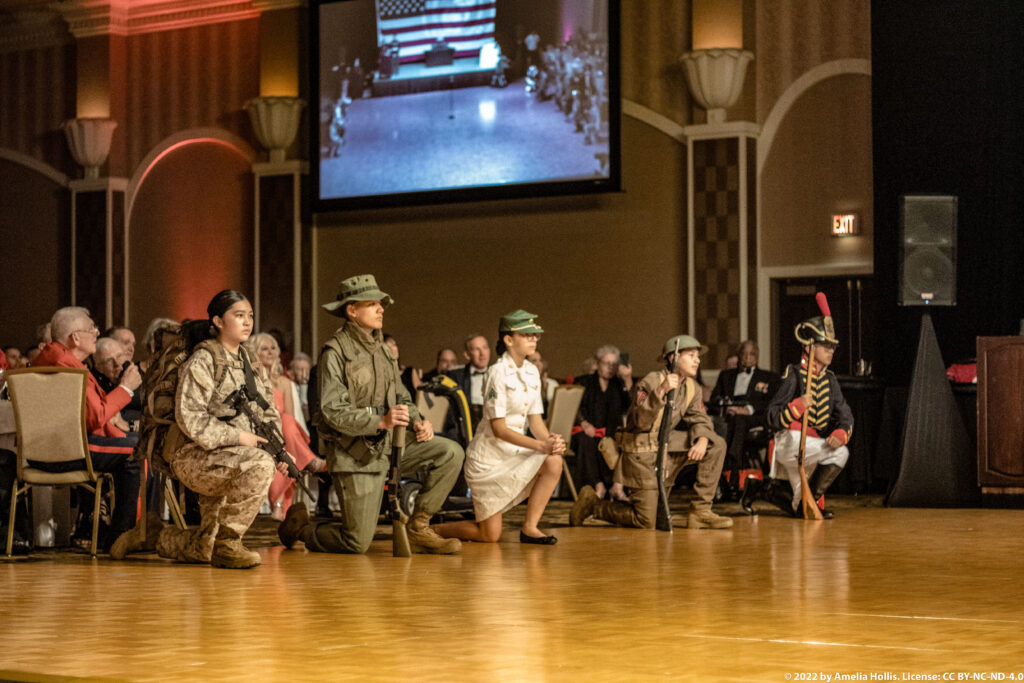 Students performing a historical military play.