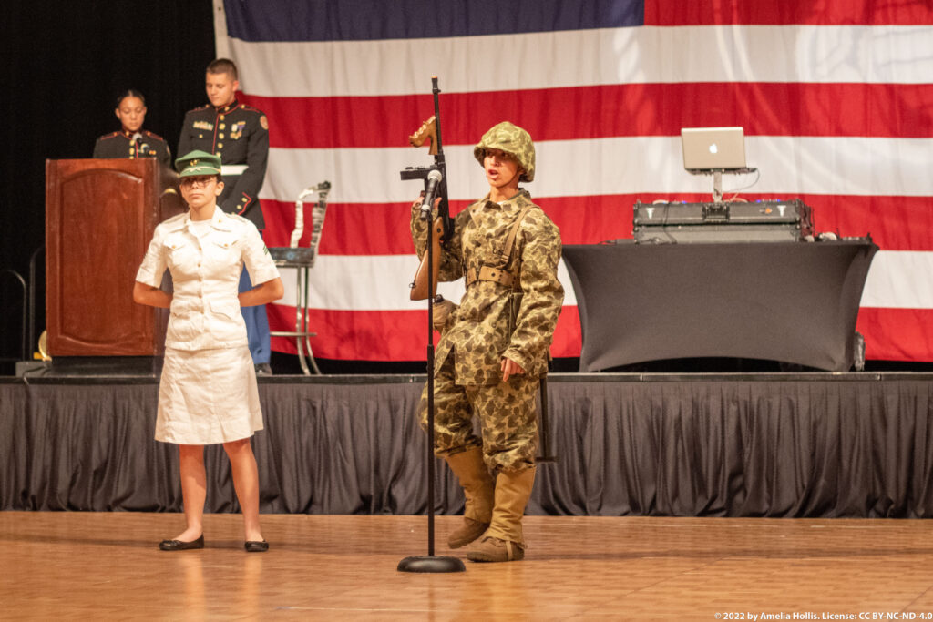 Students performing a historical military play.