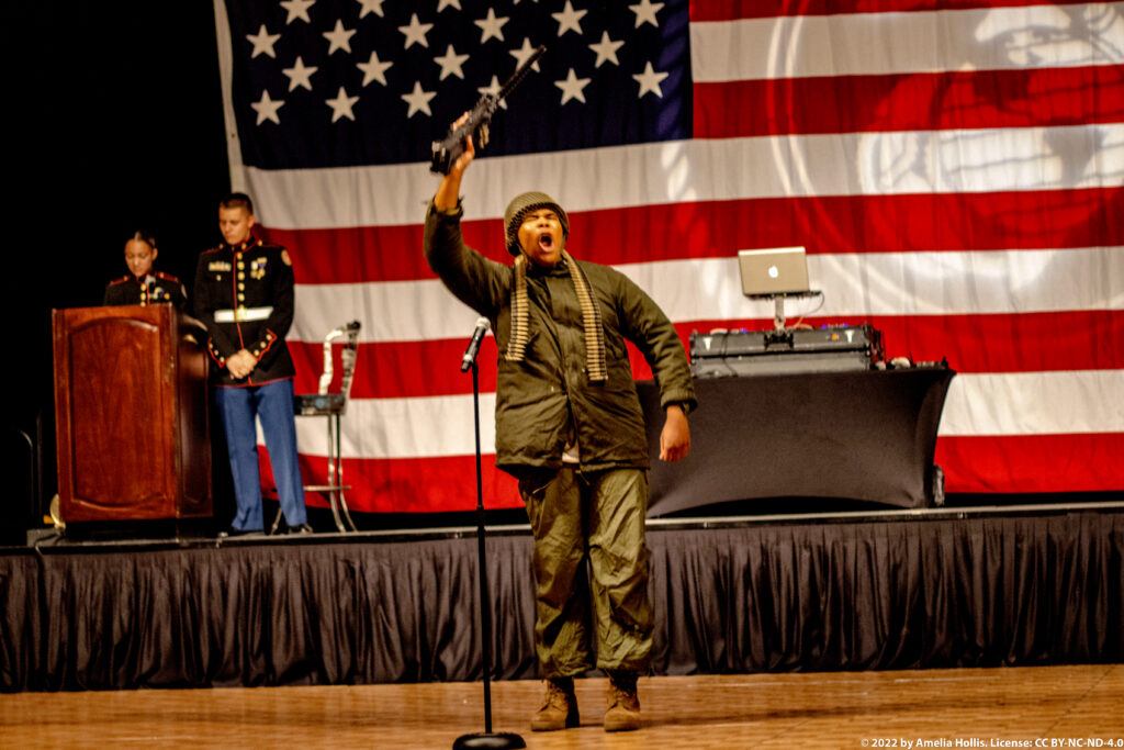 Students performing a historical military play.