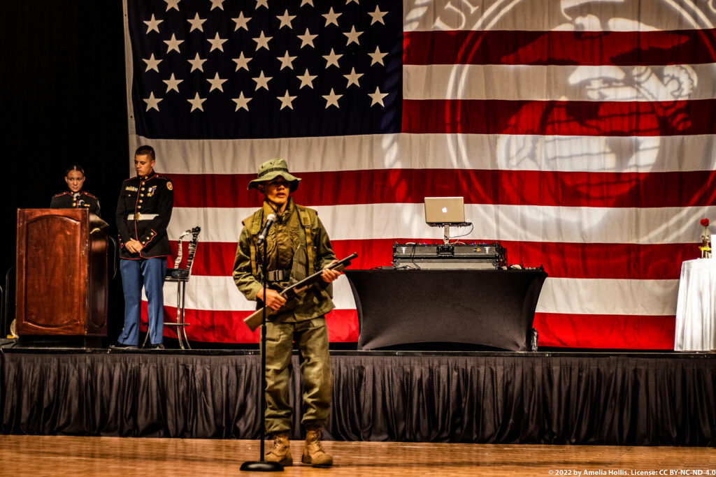 Students performing a historical military play.