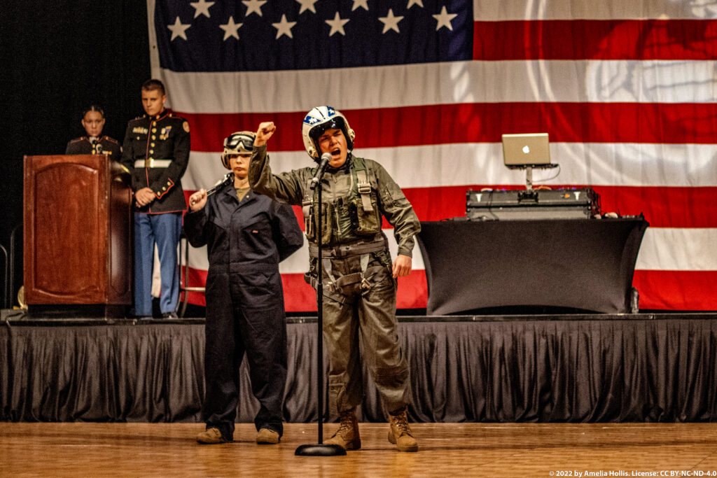 Students performing a historical military play.