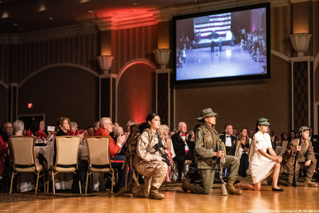 Students performing a historical military play.